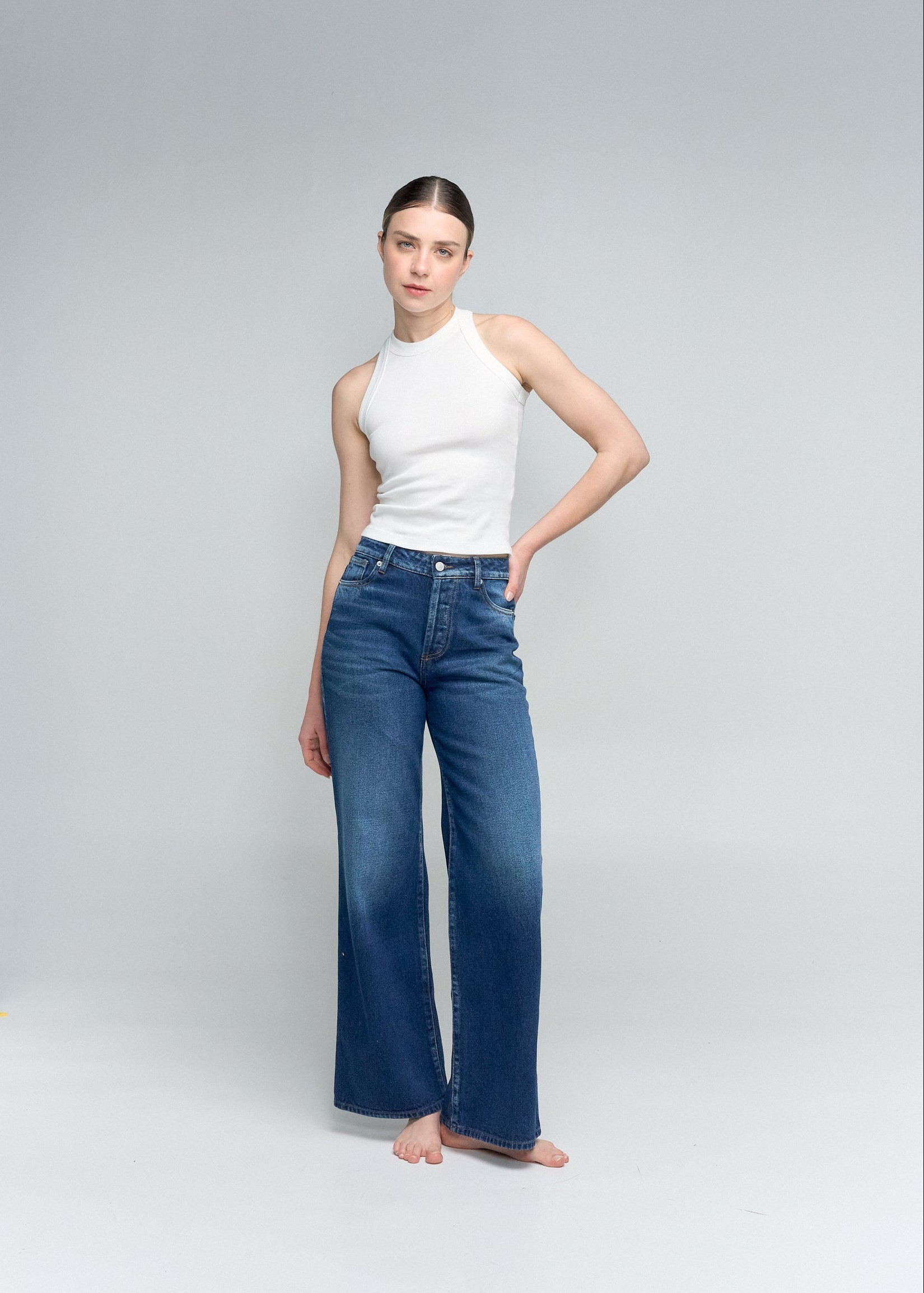 flare jean tono oscuro femenino