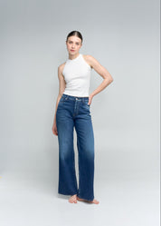 flare jean tono oscuro femenino